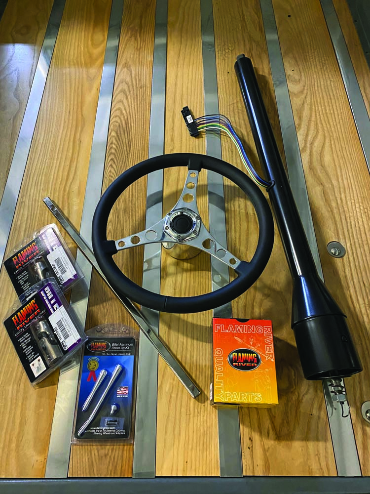 002 Flaming river steering wheel colum with a corvette 3 spoke style steering wheel