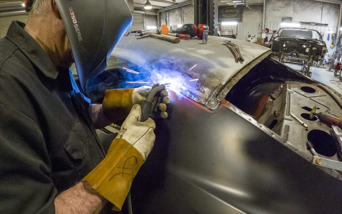 008 With everything lined up, he can finish welding in the quarter-panel to the roof.