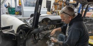 01 Scotty Troutman of Alloways Hot Rod Shop is working on the billet reservoir for the American Powertrain underdash hydraulic clutch