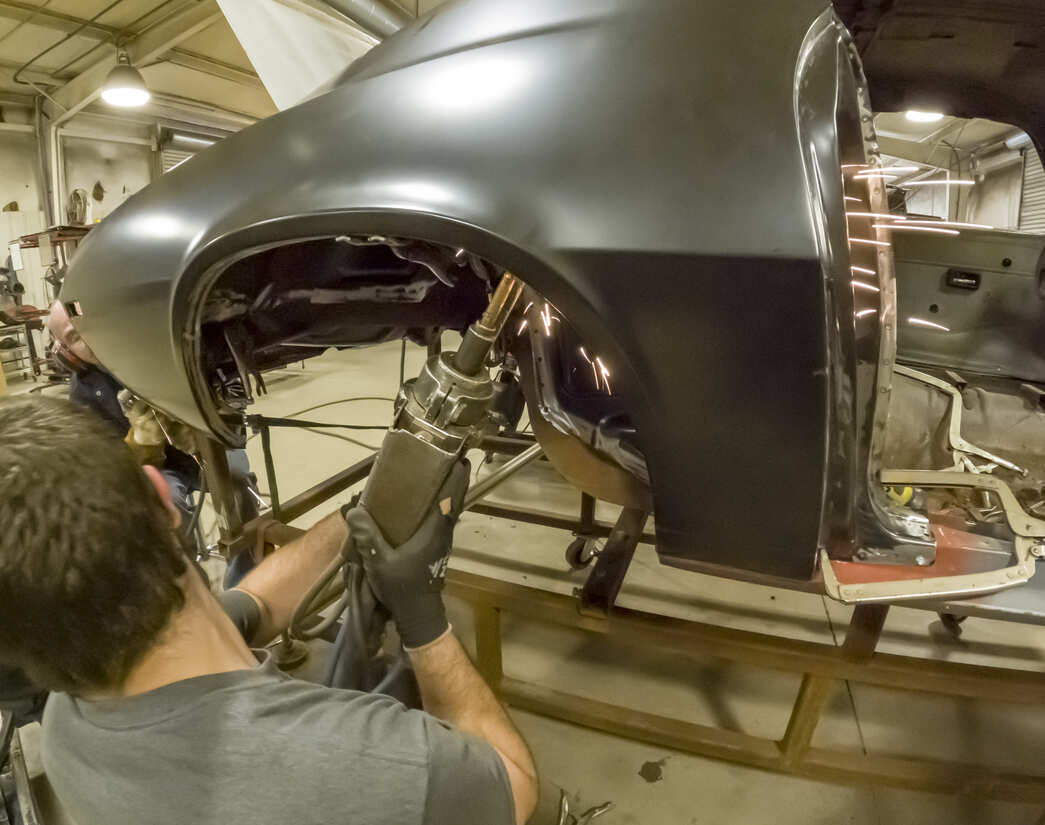 015 The Installation Center replaces body panels; it’s what they do. Using a spot welder, Hopkins recruits Brandon Lethiot to marry the outer wheelhouses to the quarter-panel.