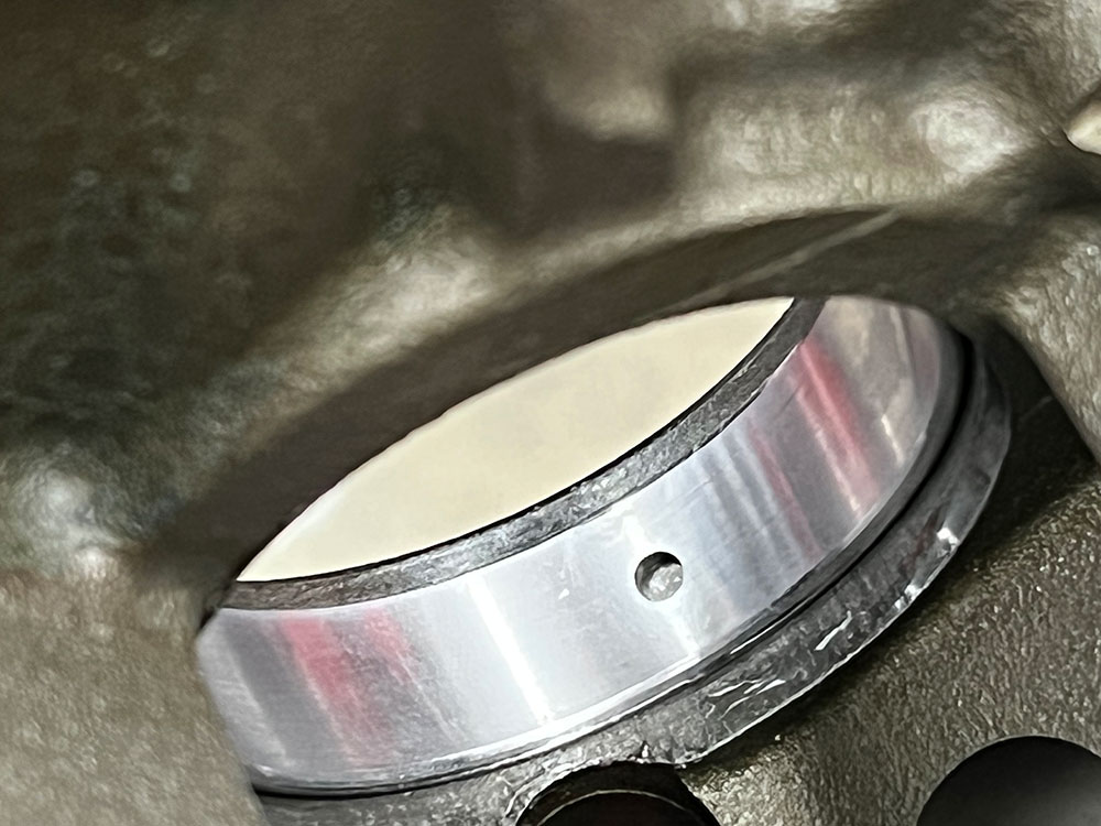 18 Here a cam bearing has been installed improperly on purpose to illustrate the importance of lining up the oil gallery holes