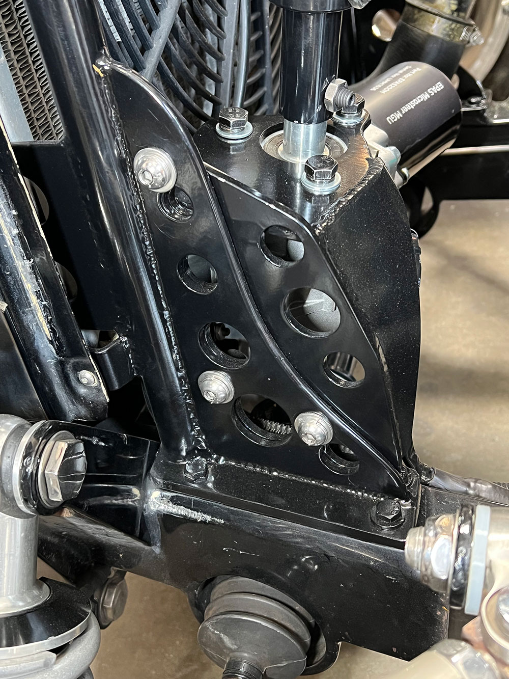 15 Kugel Komponents fabricated the stout bracket that holds the Microsteer unit