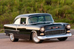 001 A sleek black 1955 Chevy Delray coupe a classic symbol of automotive style