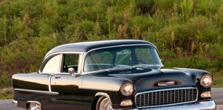 001 A sleek black 1955 Chevy Delray coupe a classic symbol of automotive style