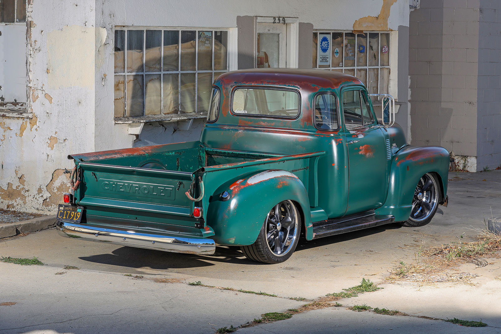 1953 chevy truck with weathered patina paint job on Craiyon