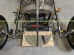 01 Here the radiator is mocked up and a strip of steel is being bent to check the desired profile