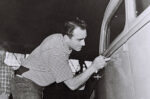 01 Tommy laying down the beltline on Dean Moon’s orange ’34 Ford coupe at the 1955 Oakland Roadster Show