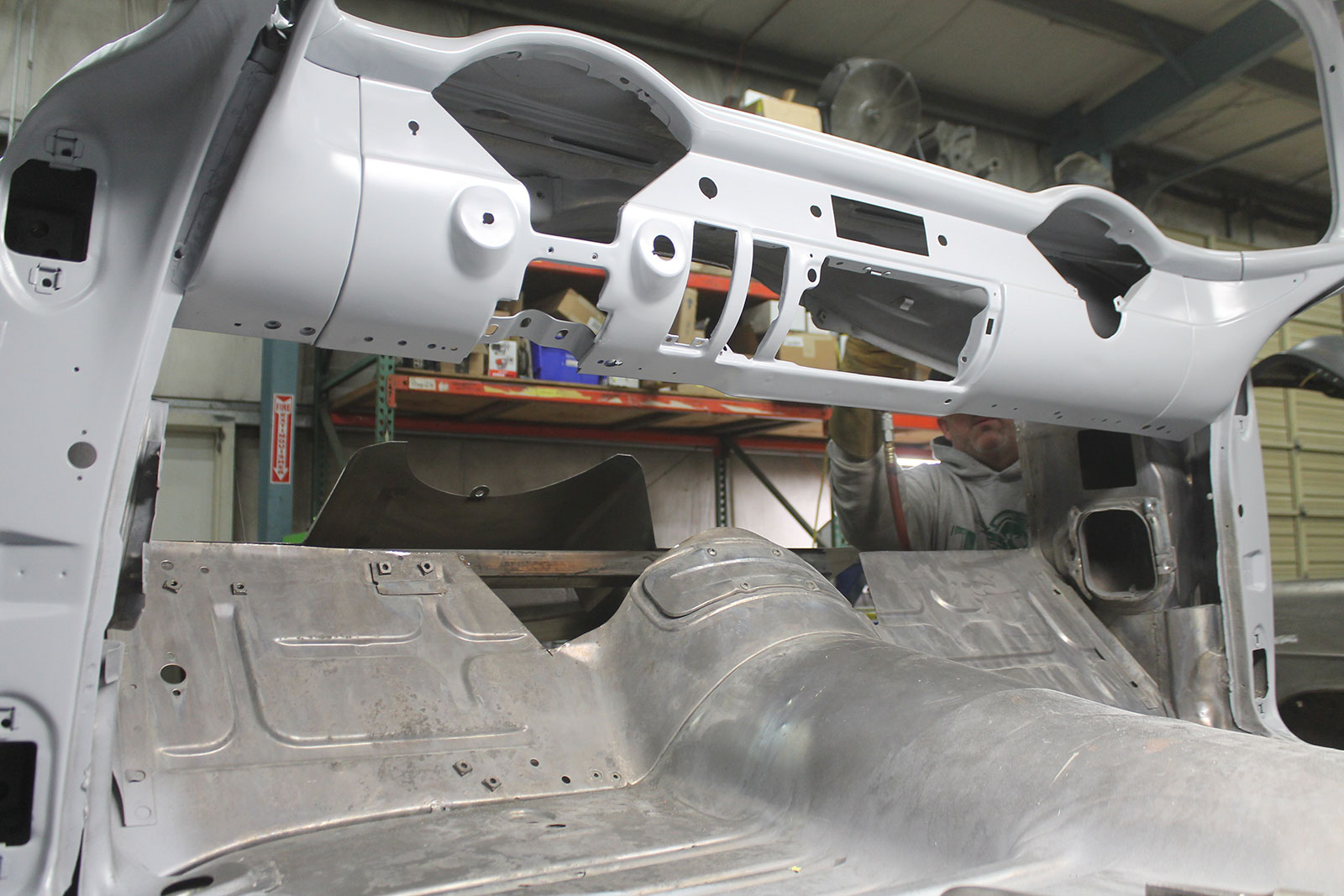 10 Initial cut of the floorboards and transmission tunnel in a 55 Chevrolet