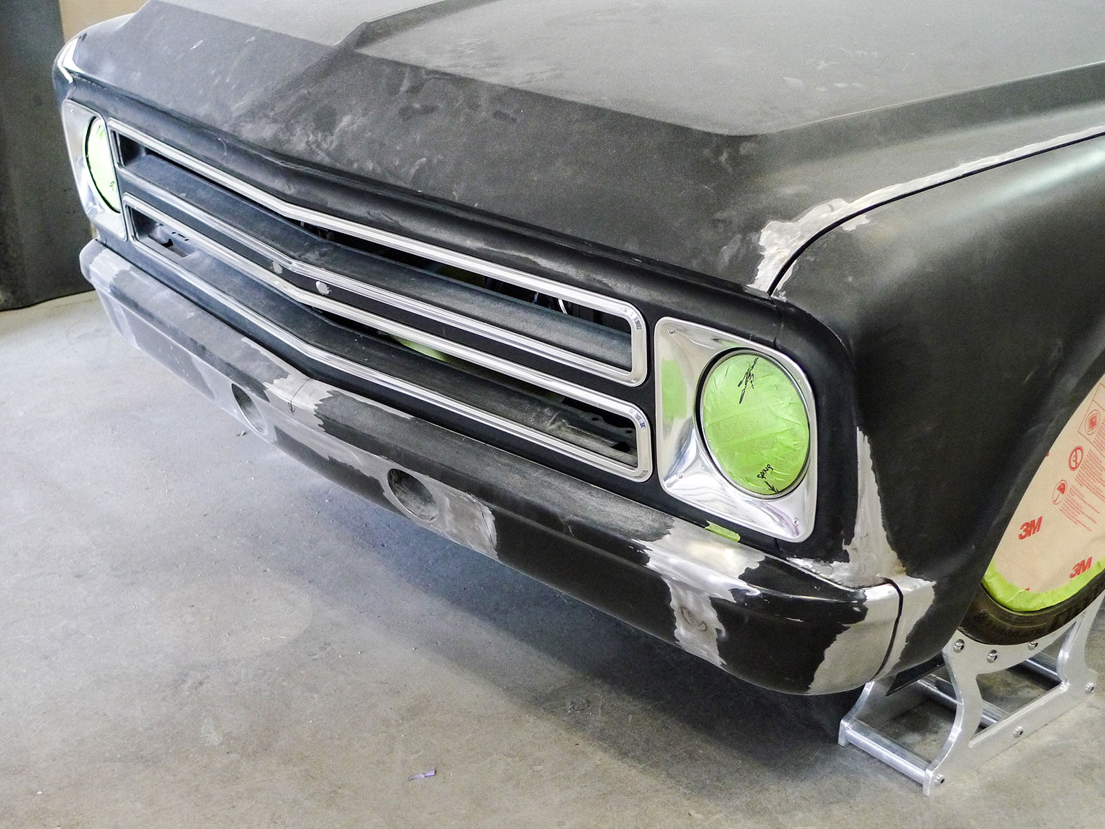 15 custom front bumper assembly on a vehicle at Premier Street Rod