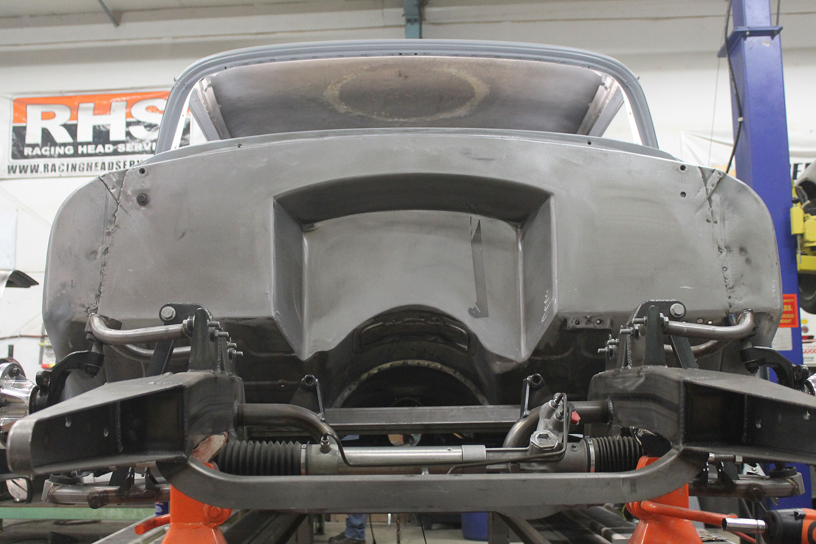 20 Finished job of a smooth firewall in a 55 Chevrolet providing ample engine room