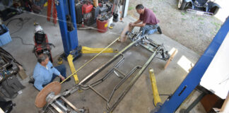 01 checking the wheelbase of the chassis that will be going under a ’52 Chevy pickup