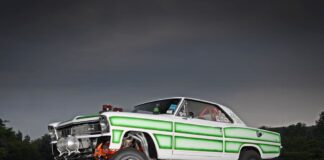 01 1966 Chevy Nova gasser with a lifted front end two tone paint and a supercharger 1966 chevy nova