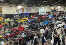 1 multiple cars in the muscle cars room at grand national roadster show