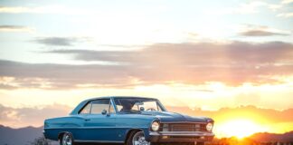 002 Side profile of a blue 1967 Chevy Nova at dusk