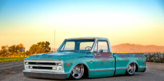 01 Teal 1968 Chevrolet C10 pickup lowered side profile at dusk