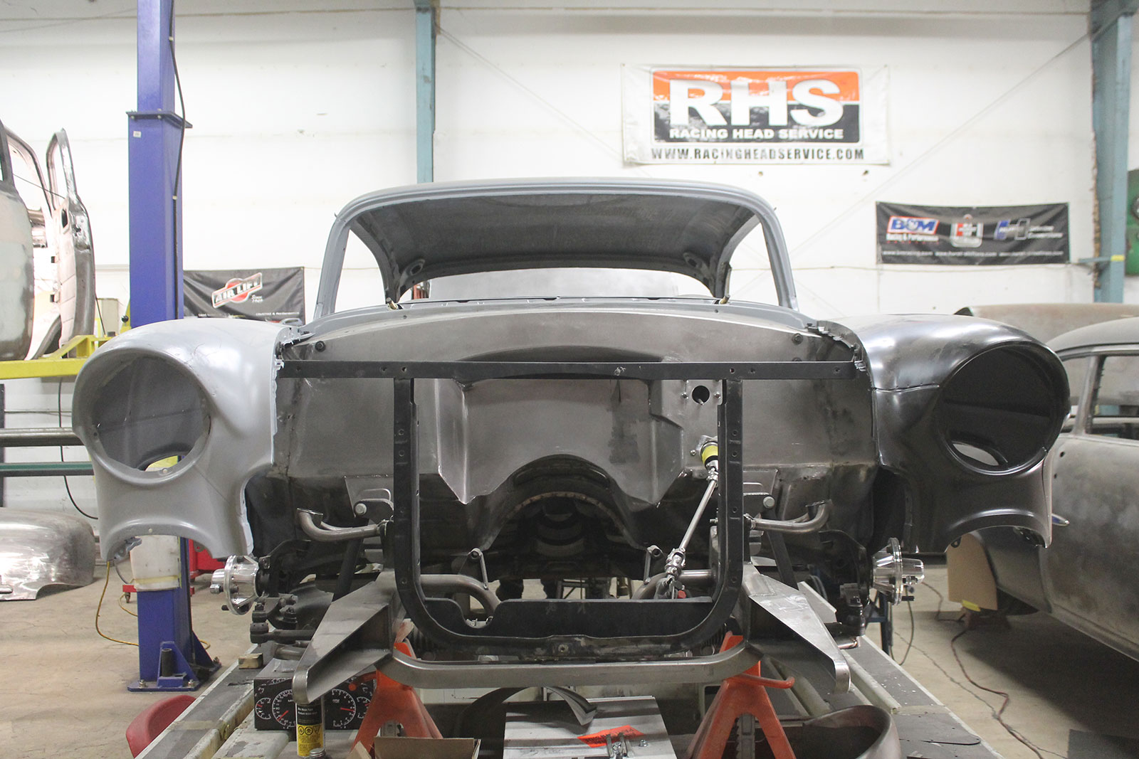 01 Vintage car fender restoration process showing original and reproduction fenders
