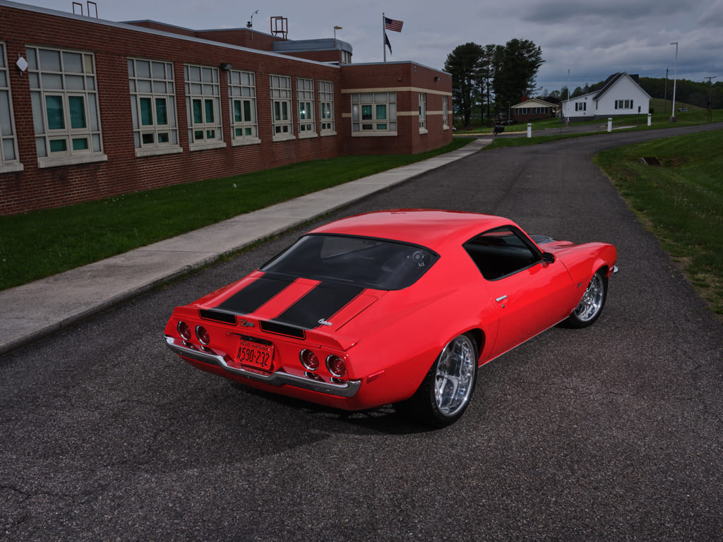 006 Rear overhead view of a red 1970 Camaro Z28 highlighting black racing stripes and taillights