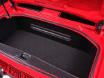 025 Open trunk of a red 1970 Camaro showing the interior lining