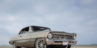 003 Front three quarter view of a 1967 Chevy Nova with chrome bumpers and modern rims