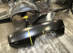 Replacing a 1969 Camaro’s Rear Quarter Panel With AMD Sheetmetal 01 A new rear quarter panel for a 1969 Chevrolet Camaro placed beside the body for fitment