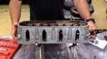 002 Cleaning and inspecting a used intake manifold part of a restoration process