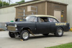 01 1955 Chevrolet Bel Air gasser with matte black paint and Blasphemi lettering sporting a custom drag race build