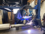000 Welder using a TIG setup to fabricate a custom exhaust pipe