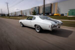 004 Rear side view of the 1971 Chevelle SS in motion featuring its iconic taillights and black stripes