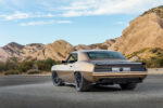 004 Rear view of 1969 Chevy Camaro featuring a modern taillight design and wide rear tires