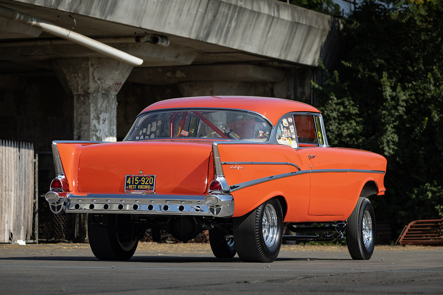 005 Rear view of a 1957 Chevy Bel Air gasser with chrome accents and West Virginia vintage license plates