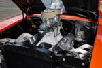 006 Dual carburetors and high rise intake in the engine bay of a 1957 Chevy Bel Air gasser