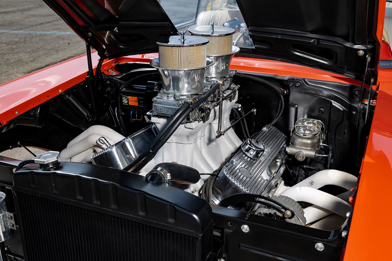 006 Dual carburetors and high rise intake in the engine bay of a 1957 Chevy Bel Air gasser