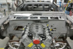 01 1959 Chevrolet undergoing a custom build with a high performance V8 engine mock up in a bare metal engine bay