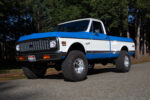 01 1972 Chevrolet K10 lifted truck with two tone blue and white paint off road tires and chrome grille