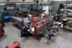 01 Technicians work on the 1962 Chevy convertible fabricating floor and firewall reinforcements