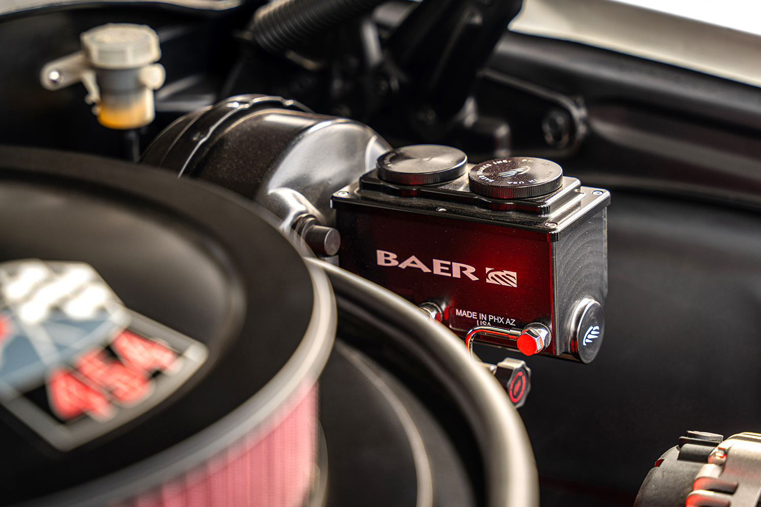 011 Close up of a Baer brake master cylinder in a 1971 Chevrolet Chevelle SS engine bay