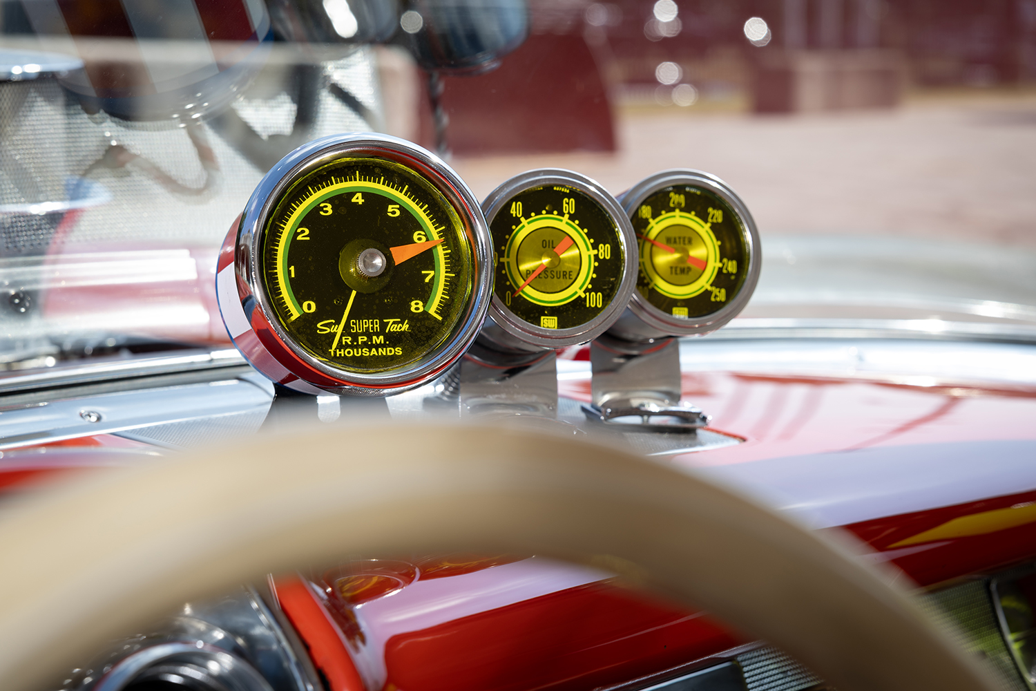 011 Sun Super Tach RPM gauge with additional oil pressure and water temperature gauges inside the 1957 Chevy Bel Air gasser