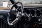 013 Classic SS badged steering wheel inside the 1971 Chevelle featuring a black interior