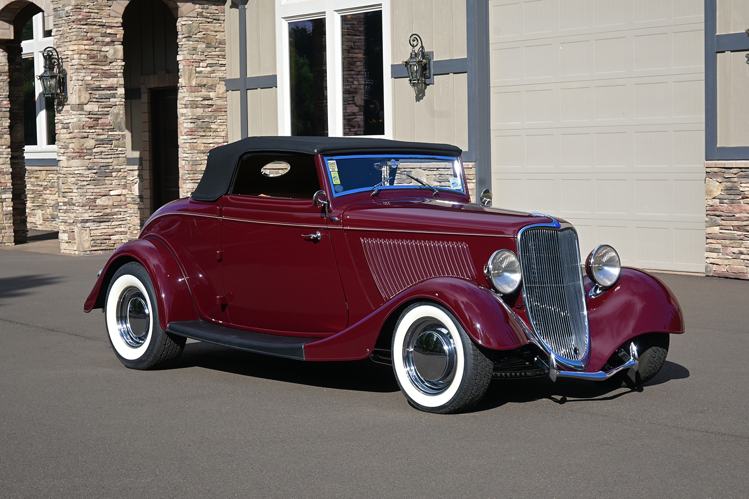 02 1933 Ford Cabriolet front grille with vertical chrome bars dual round headlights and streamlined fender design