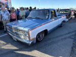 04 Classic Chevrolet C10 in blue and white with modern wheels drawing crowds at the Triple Crown Truck Show