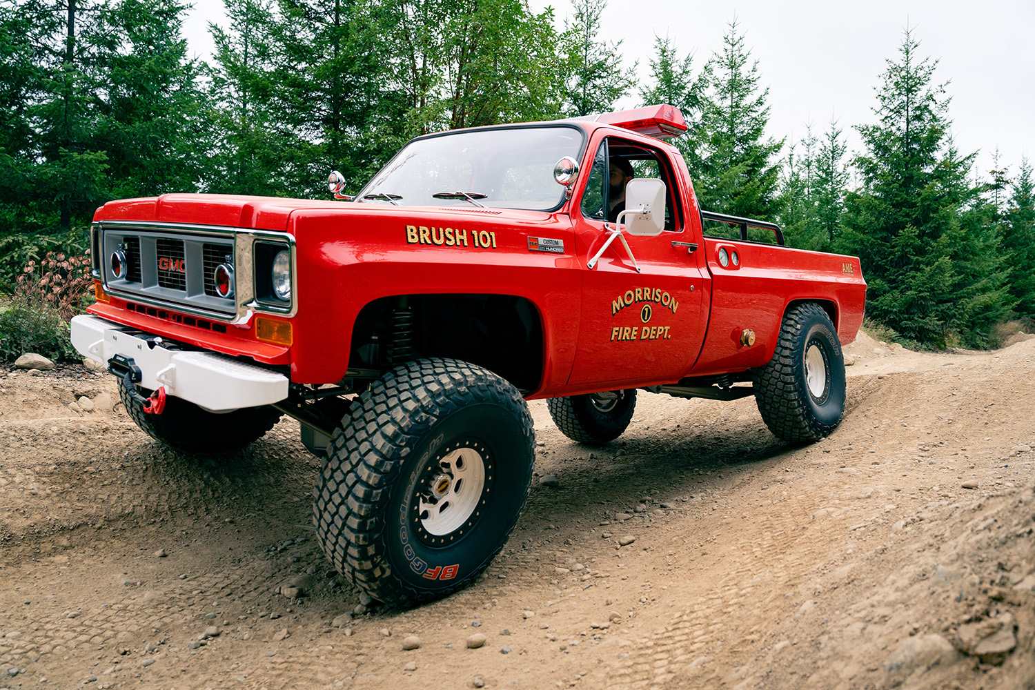 04 Close up of 1979 GMC K2500 Brush 101 with aggressive BFGoodrich tires ready for rough terrain