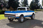 05 Supercharged engine bay in 1972 Chevy K10 featuring modern upgrades blacked out detailing and a clean organized layout