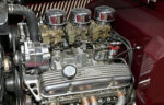 06 1933 Ford Cabriolet engine bay with triple Stromberg carburetors Edelbrock intake manifold and polished valve covers