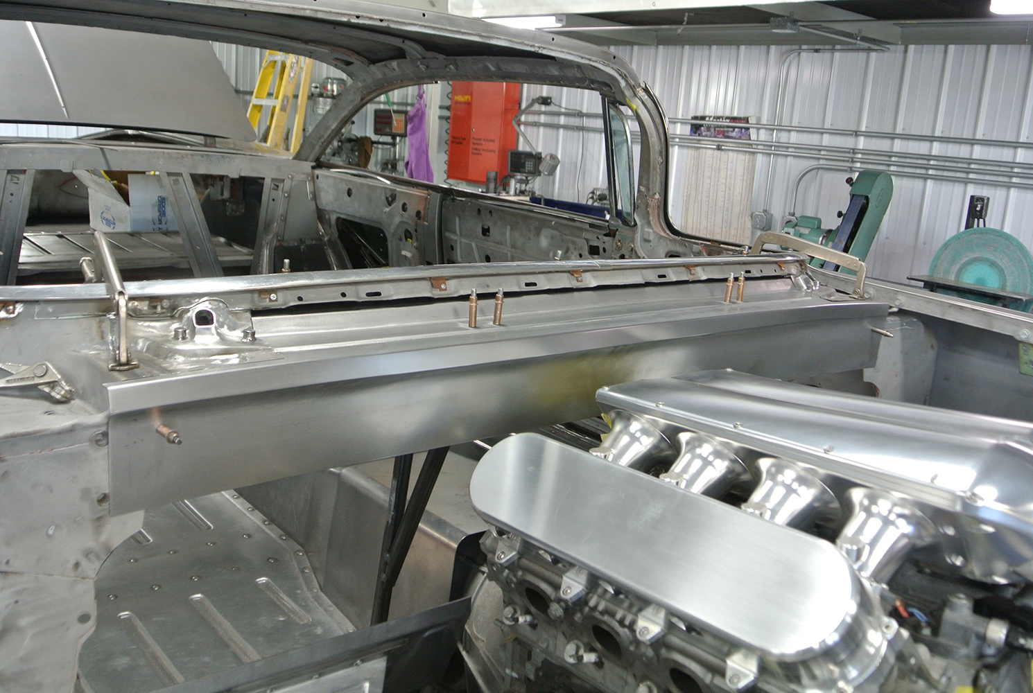 06 Fabricated dashboard structure in the 1959 Chevy with a clear view of the custom engine placement