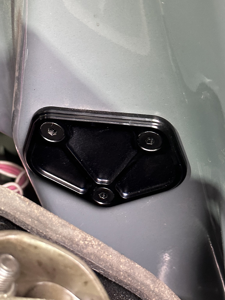 06 Lokar throttle assembly mounted securely to firewall with visible hardware in a clean C10 setup