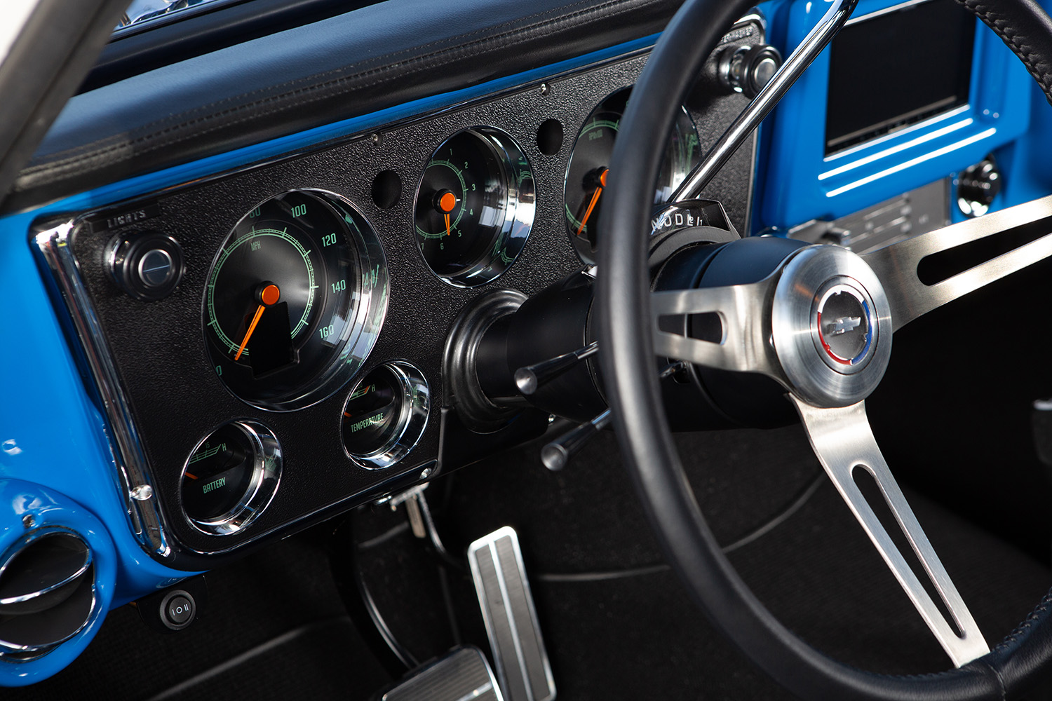 09 1972 Chevy K10 dashboard blending vintage design with modern touchscreen controls