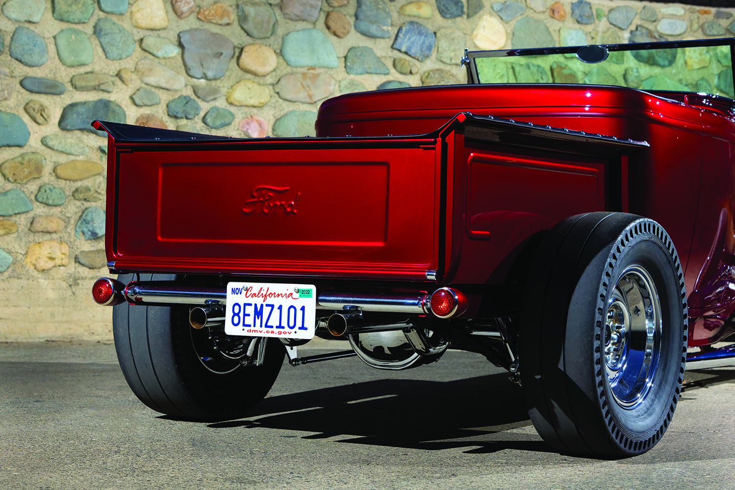 09 Close up of the 1932 Ford Roadster’s engine bay featuring a high performance V8 with chrome headers