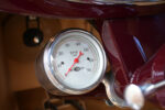10 1933 Ford Cabriolet tachometer close up showing vintage RPM gauge with chrome housing and custom dial