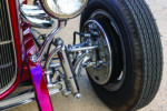 10 Low angle shot of the 1932 Ford Roadster pickup emphasizing its wide front tires and custom grille