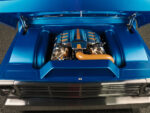 13 Under hood view of 1969 Ford F 100 with custom painted engine cover and bold copper accented intake